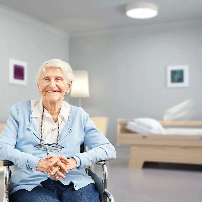 Bewohnerin in ihrem Zimmer